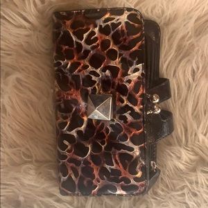 Black, reddish orange and silver leopard wallet